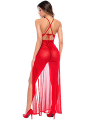 Rear view of a red sheer long gown with a dotted pattern, halter neck, crisscross back straps, and high leg slits.