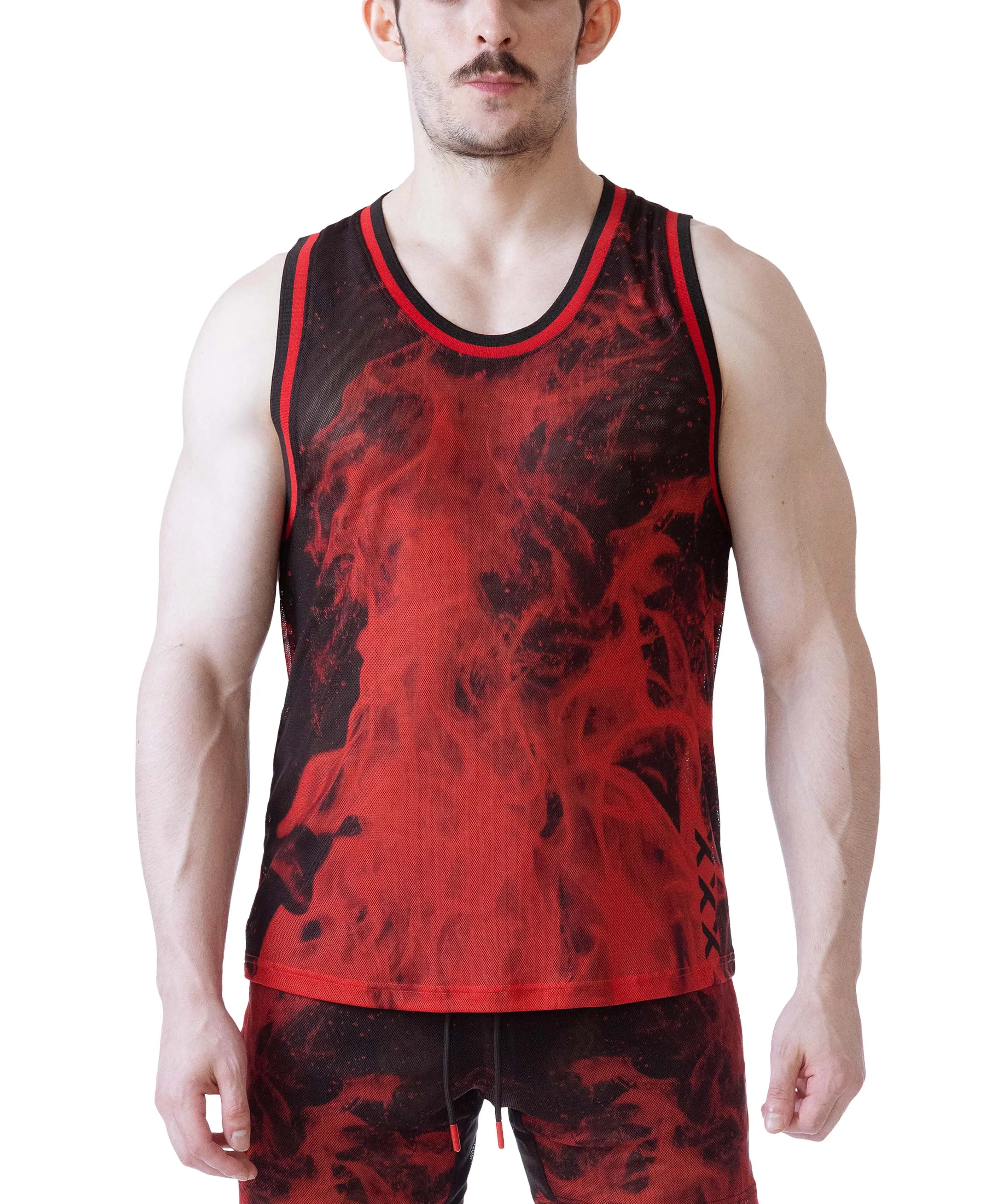 Male model wearing a sleeveless red and black mesh tank top with flame pattern and red trim by Nasty Pig