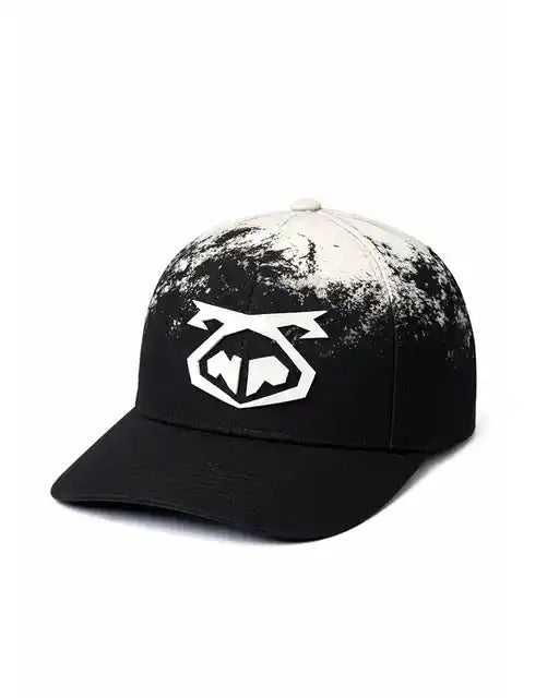 Black oxidize snout cap with white splatter paint effect and bold geometric logo on the front for casual wear