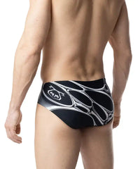 Black and white chromium bikini swim trunks with bold abstract interconnected oval shapes pattern