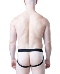 Back view of a person wearing a black elastic jockstrap with straps around the waist and under the buttocks by Nasty Pig