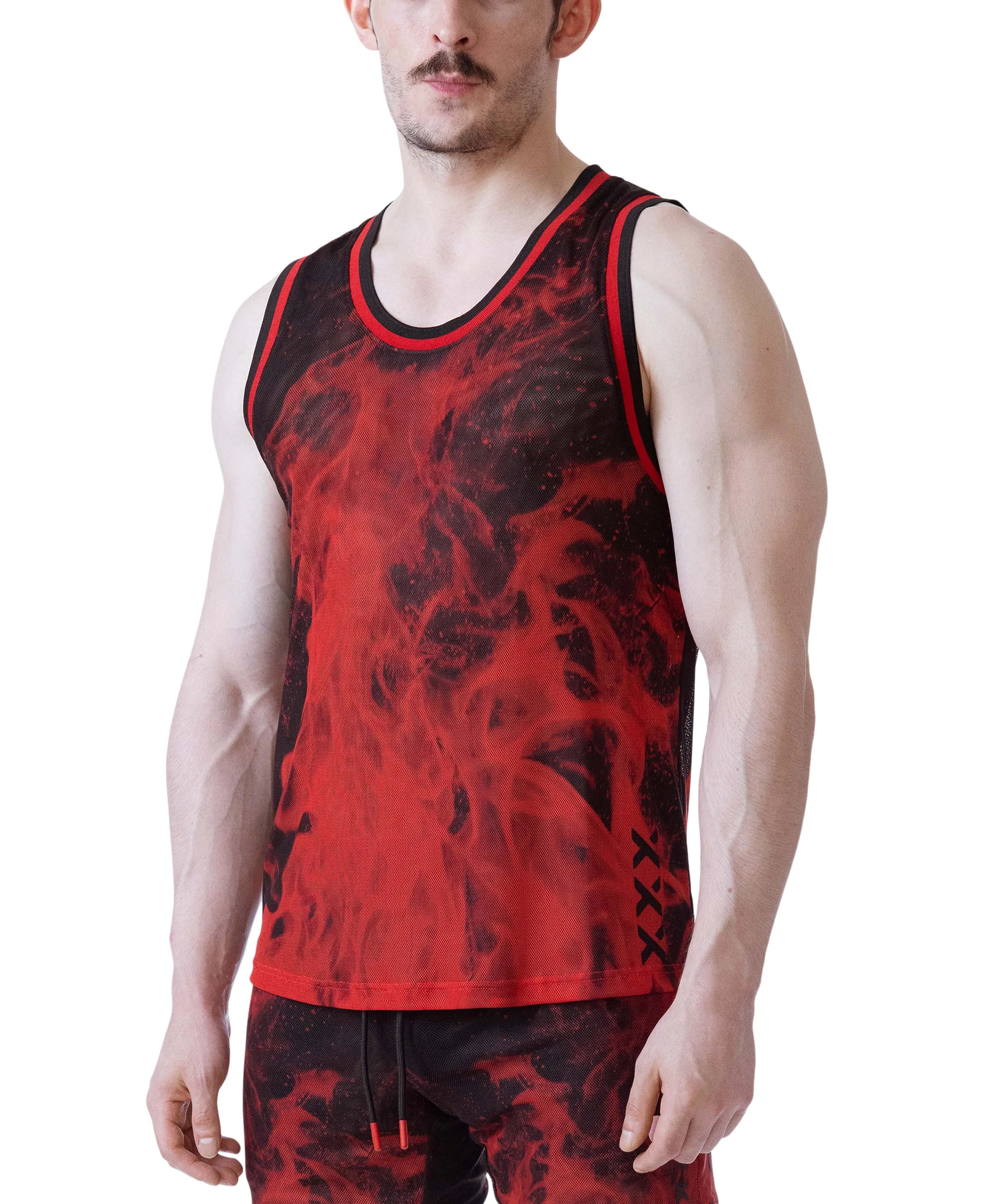 Close-up of a man wearing a red and black mesh tank top with flame-like pattern and black and red trim by Nasty Pig