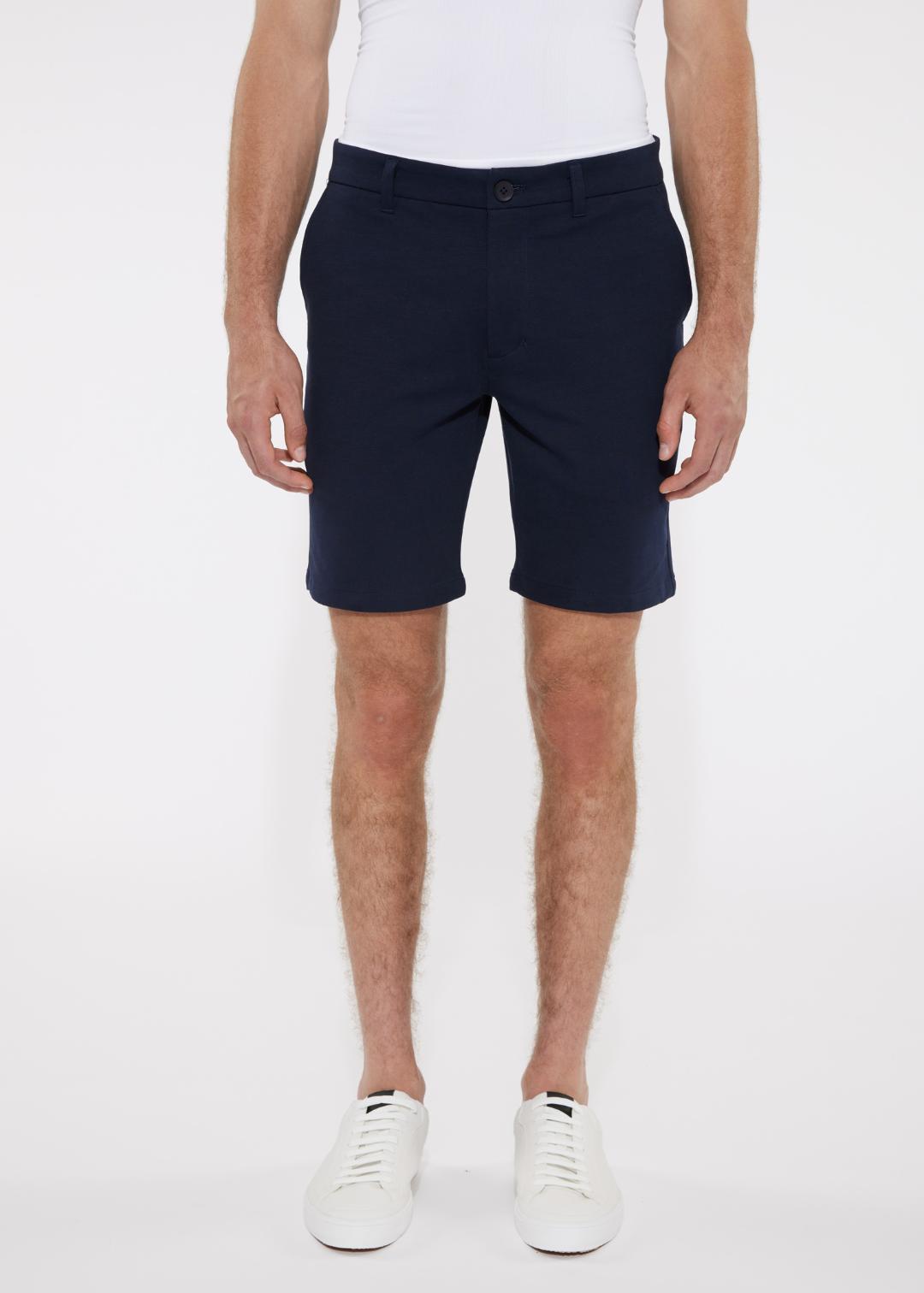 Navy blue solid stretch knit shorts with classic fit and button closure made from comfortable knit fabric