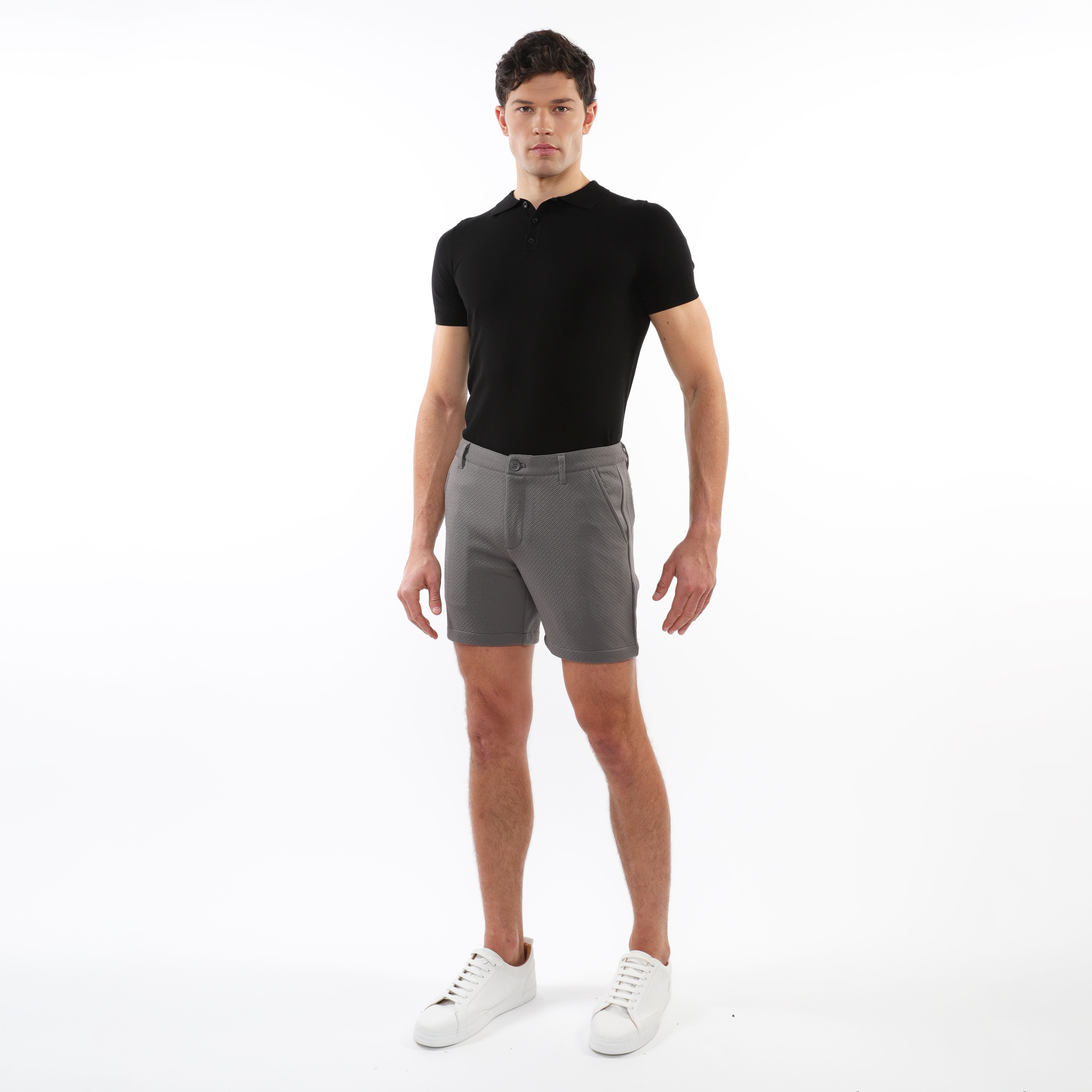 Gray textured stretch knit chino shorts with classic fit and subtle stitching details for casual wear