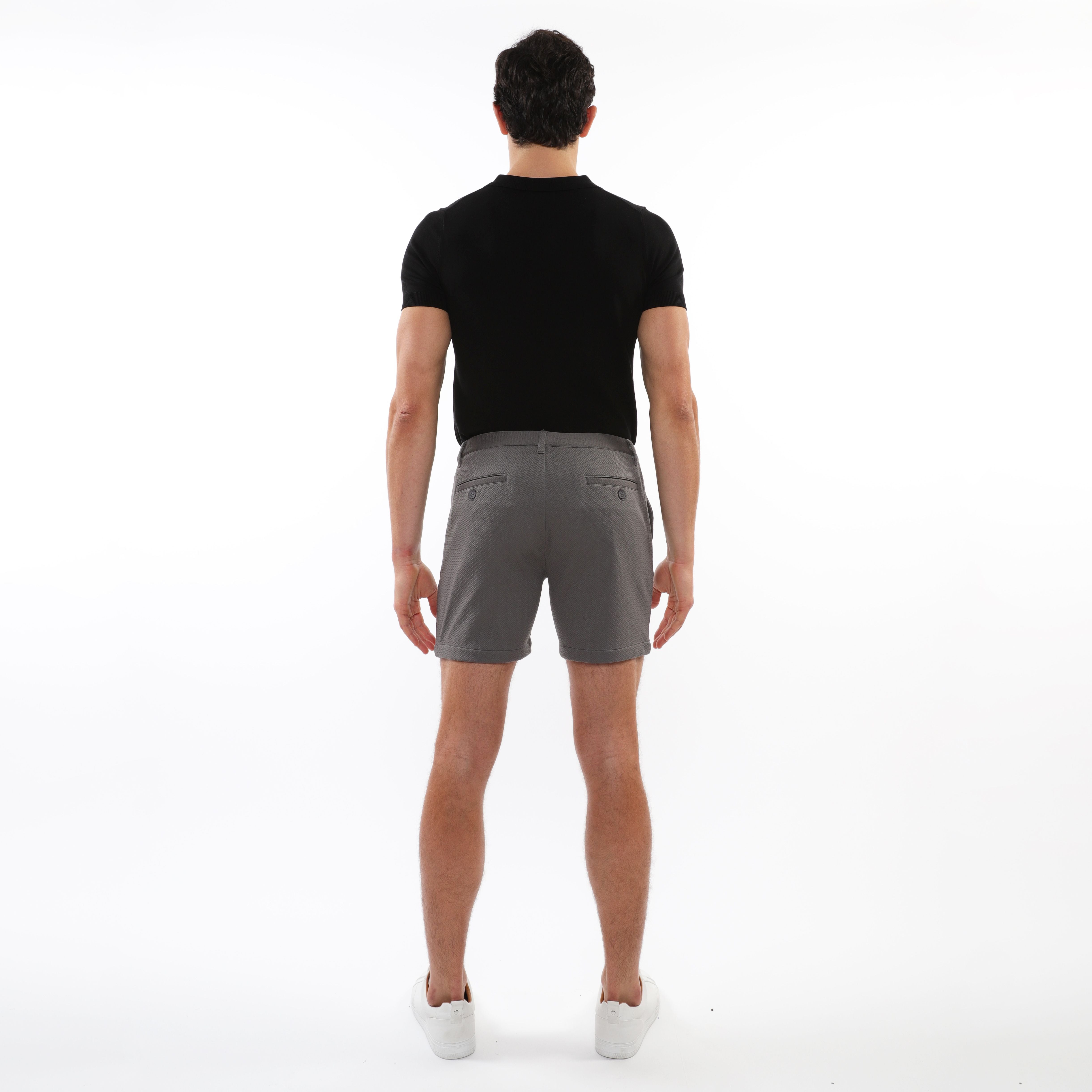 Gray textured stretch knit chino shorts with a sleek tailored fit and subtle side pockets for casual wear