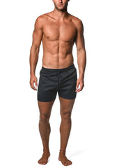 Black jacquard stretch swim shorts with mesh liner and drawstring for comfortable water activities