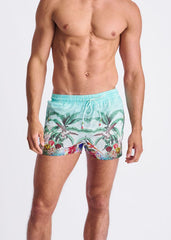 Light blue tropics print swim shorts with mesh lining featuring vibrant palm trees birds and flowers design