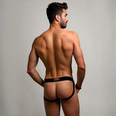 Black ydp brand prowlerr switch jockstrap briefs with a red logo waistband shown from the back side