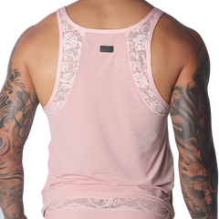 Romantic pink tank top in ribbed mesh with decorative floral lace trim along the shoulder straps and hem.
