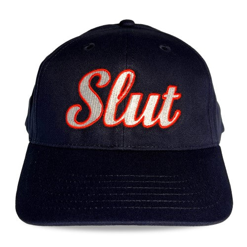Black cotton spunky monkee cap embroidered with slut in red and white thread on the front panel