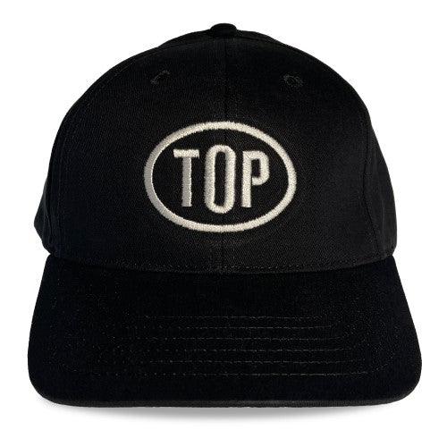 Black spunky monkee cap with white embroidered top logo in an oval on the front panel