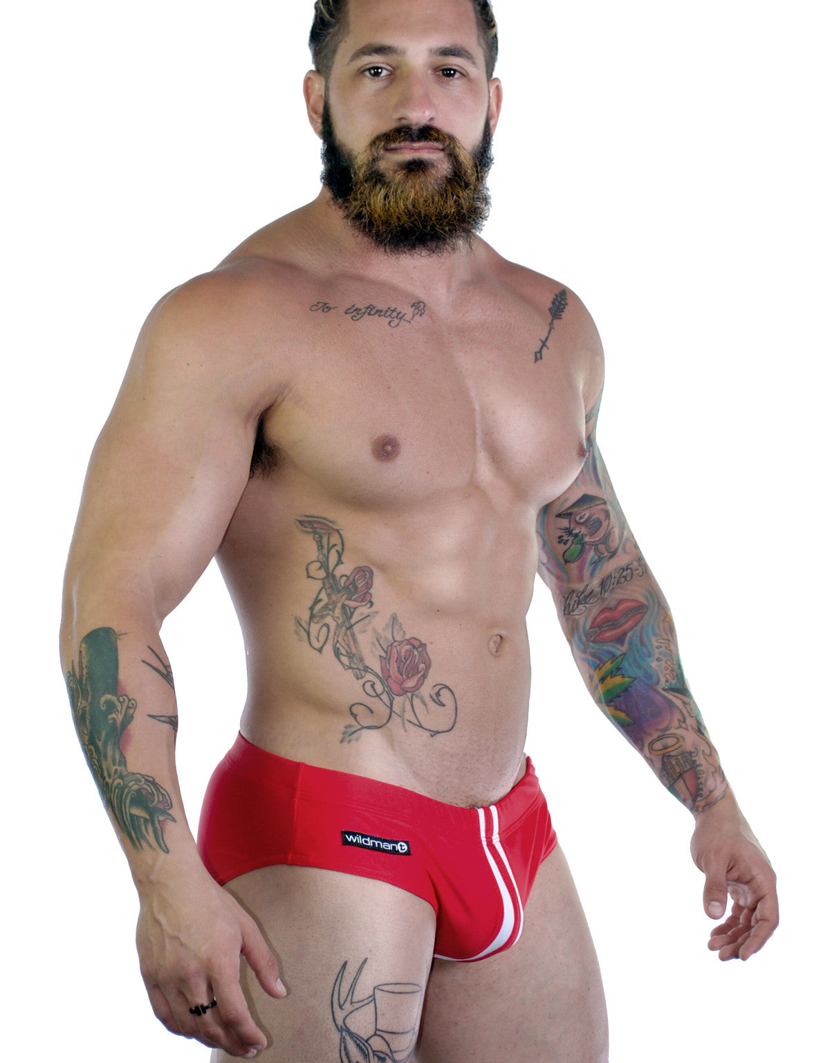 Sportivo Bikini in red with vertical white stripe detail and a Wildman logo patch on the hip.