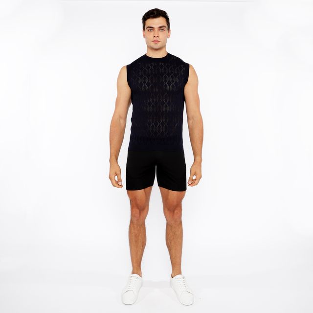 Black sleeveless knit vest with intricate diamond pointelle geometric pattern perfect for layering and style