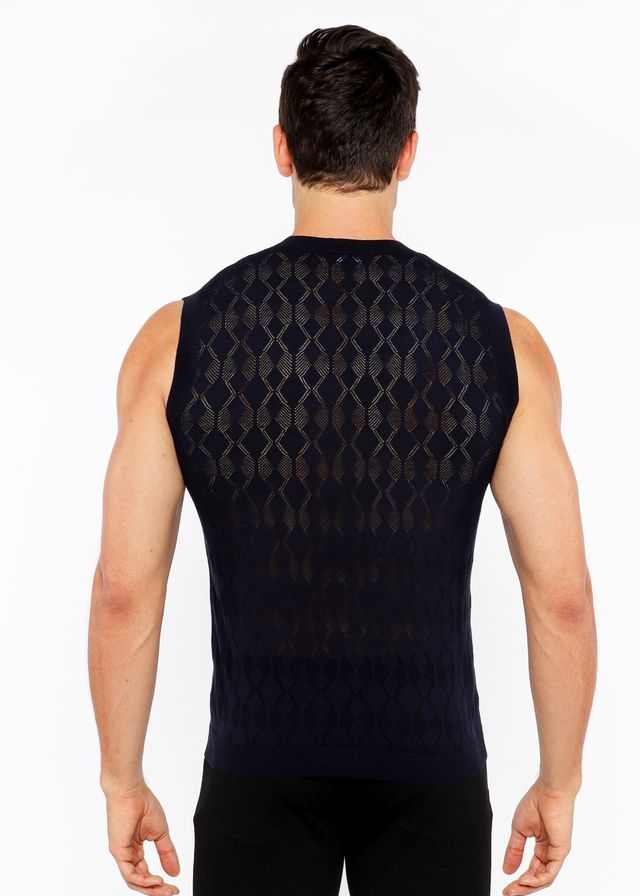 Black sleeveless diamond pointelle knit vest showing the textured diamond pattern on the back side