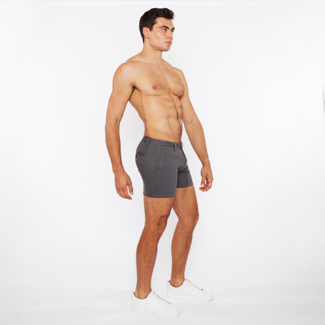 Gray linen-look textured athletic shorts with zip pockets and subtle waistband detail in sleek modern design