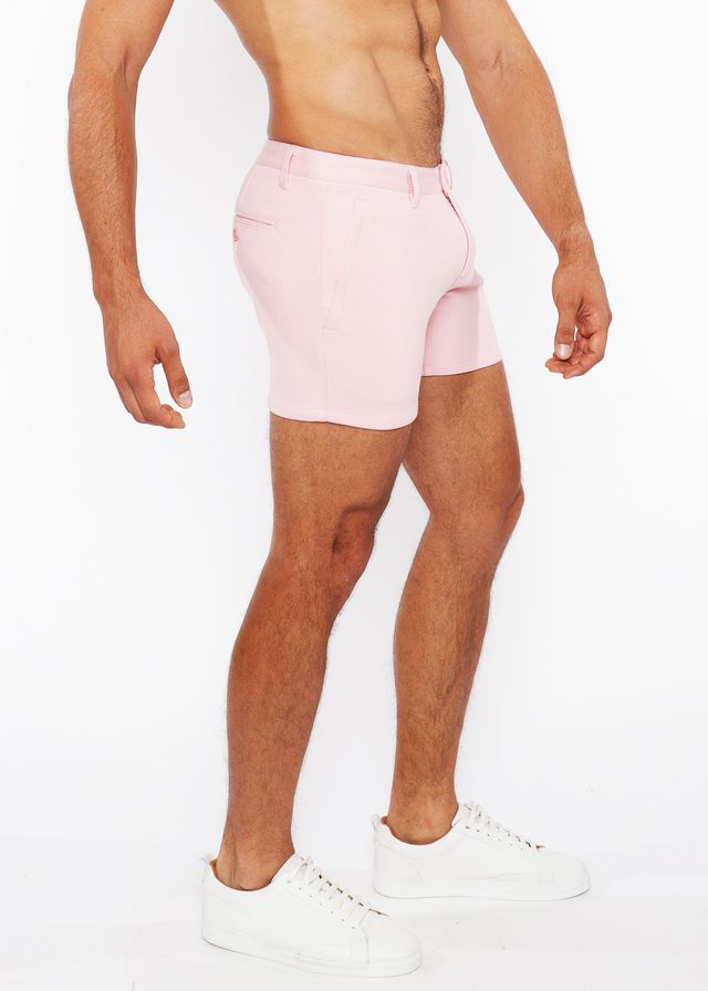 Pink linen-look textured tailored shorts with modern cut and subtle zip side pockets