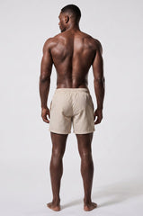 Adonis von Kyhry Herren-Badeshorts in Sandstein