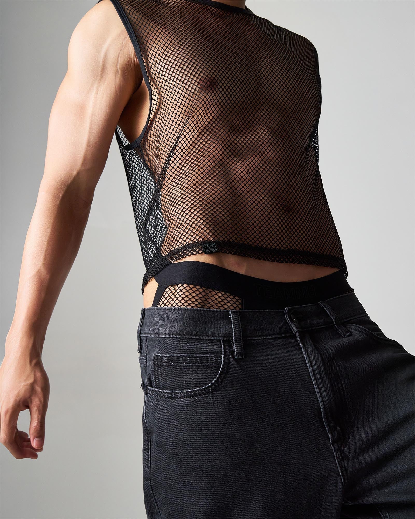 Black mesh sleeveless top edge net mesh muscle tank with fitted cropped design in breathable lightweight fabric