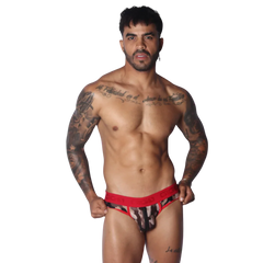 Red camouflage jockstrap with a branded elastic waistband, vertical front zipper detail, and sheer mesh fabric.