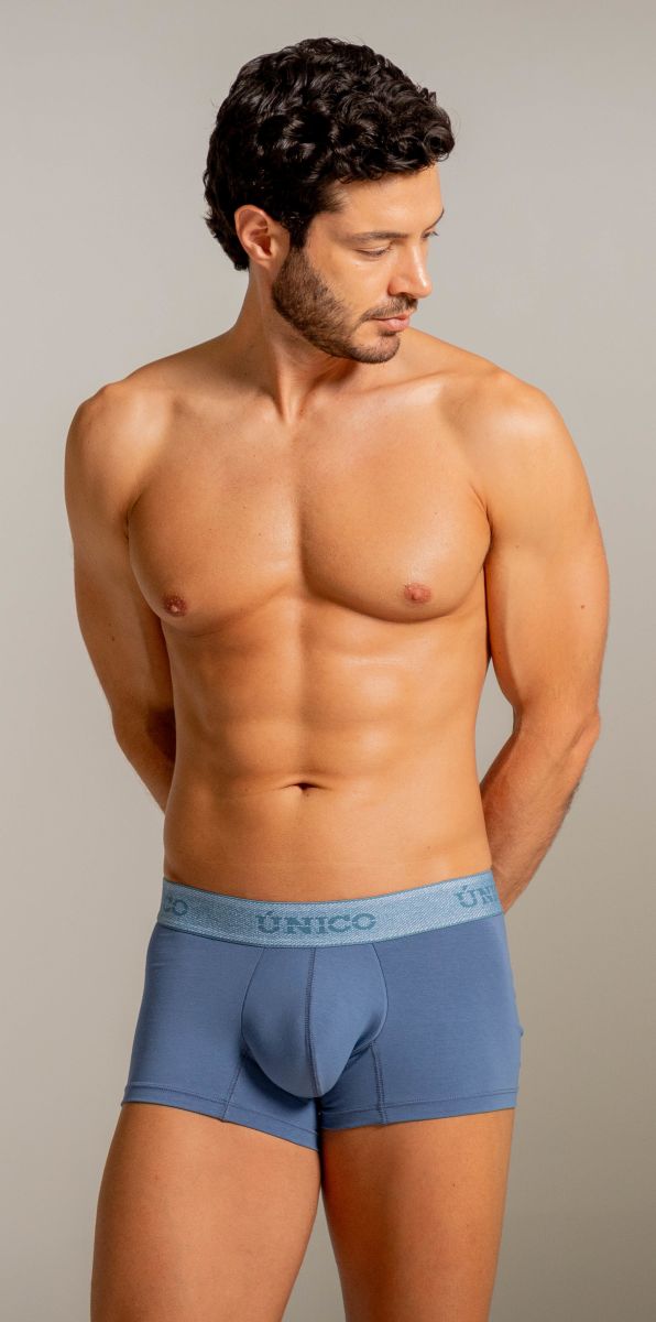 Blue unico men’s boxer briefs with light blue elastic waistband featuring unico logo in teal color for everyday use