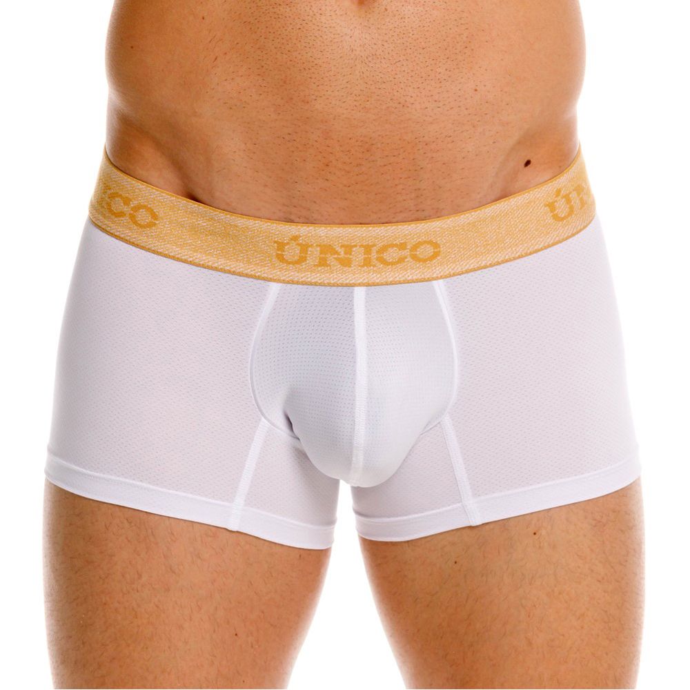 White unico boxer briefs with gold elastic waistband featuring brand name for premium athletic fit