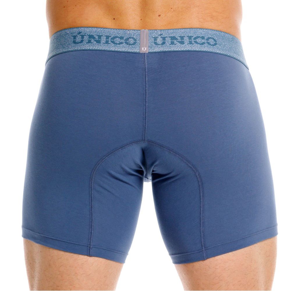Blue unico men’s boxer briefs in teal with textured waistband featuring unico logo for premium comfort and style
