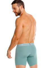 Teal unico ceramic boxer briefs 26040100221 with light gray waistband and dark unico logo in green color