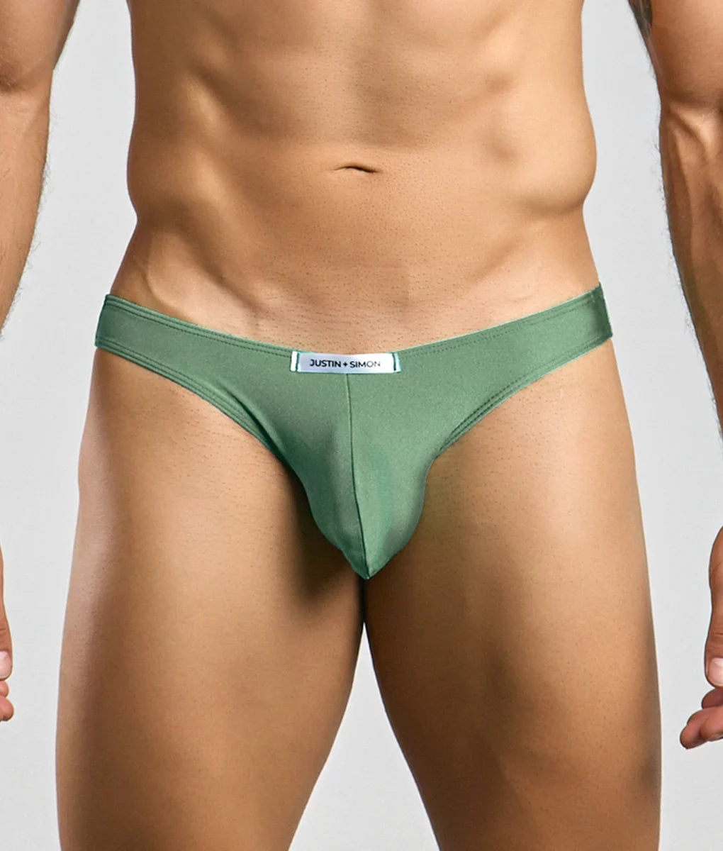 Justin plus simon classic mens bikini olive green thong made of smooth fabric with subtle sheen and branded waistband label