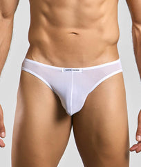 White sheer mesh briefs with a white waistband featuring the justin + simon brand label from classic mens bikini mesh collection