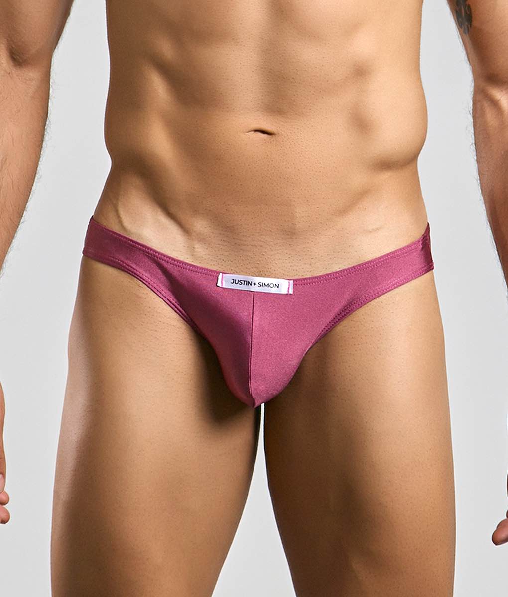 Justin simon classic mens bikini in magenta with smooth fabric finish and white label at the waistband