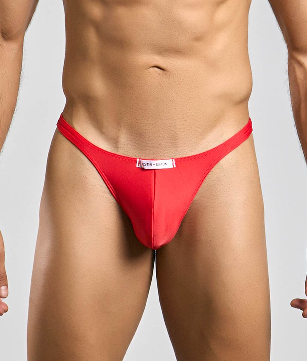 Red thong classic tanga by justin + simon featuring a white label at the waistband on the back side