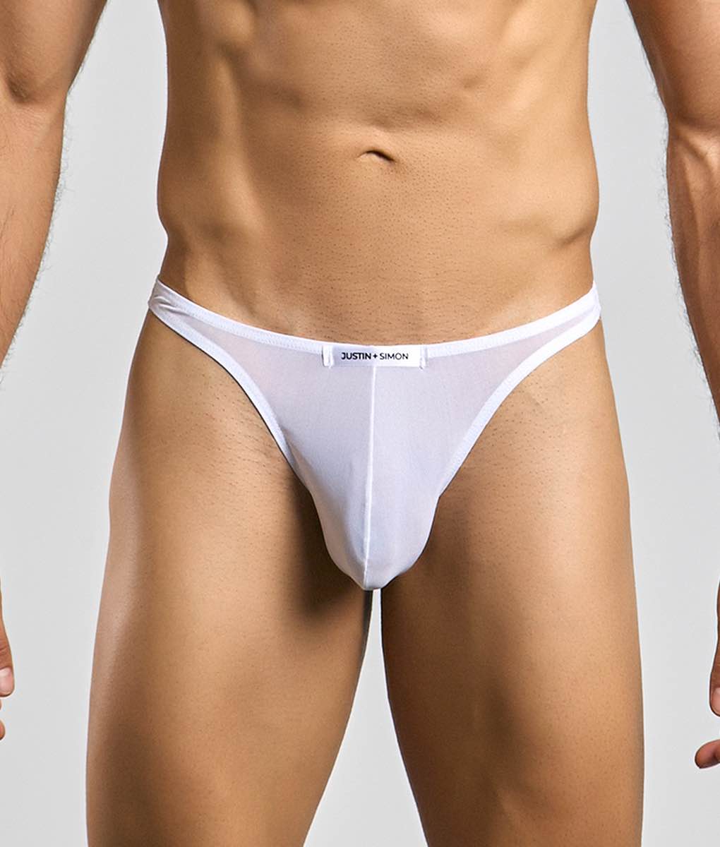 White sheer mesh thong with black justin plus simon label on waistband from justin plus simon classic tanga mesh collection
