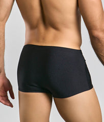 Black form-fitting boxer briefs with smooth stretchy fabric and subtle side seam detailing from justin + simon classic boxer