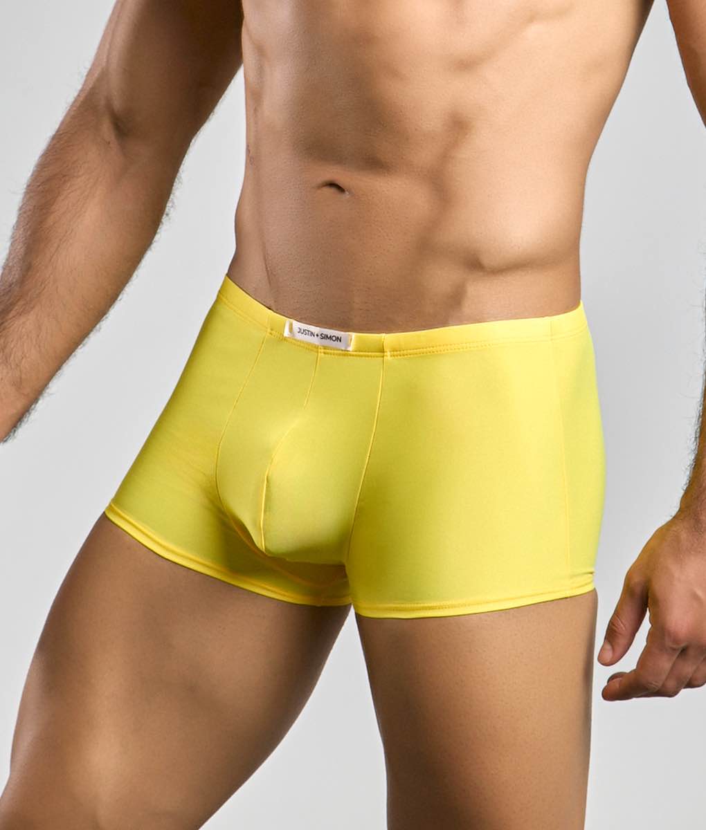 Bright yellow justin simon classic boxer men’s briefs with smooth stretchy fabric and branded waistband tag