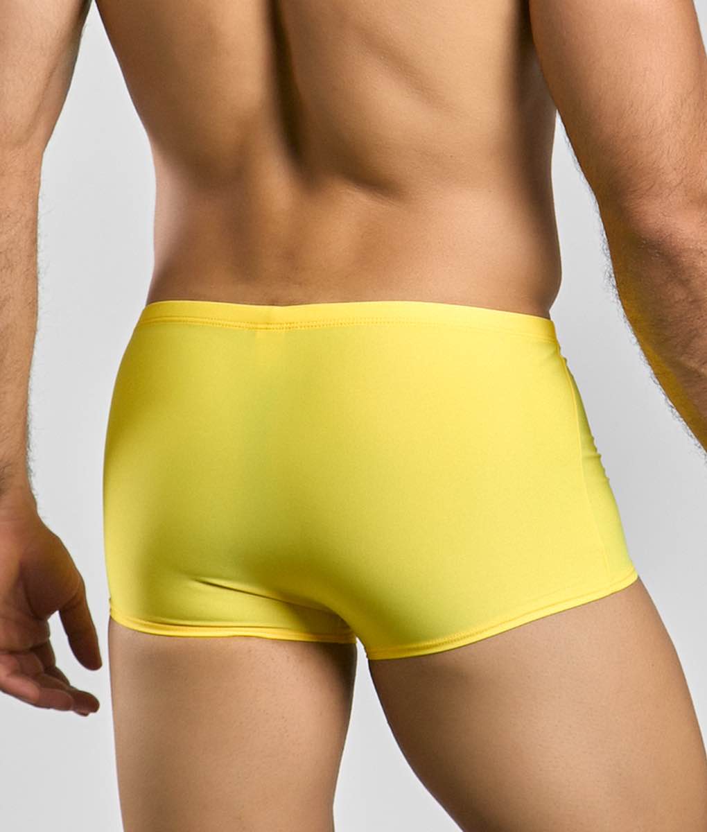 Justin plus simon classic boxer bright yellow form-fitting swim trunks made of smooth stretchy fabric