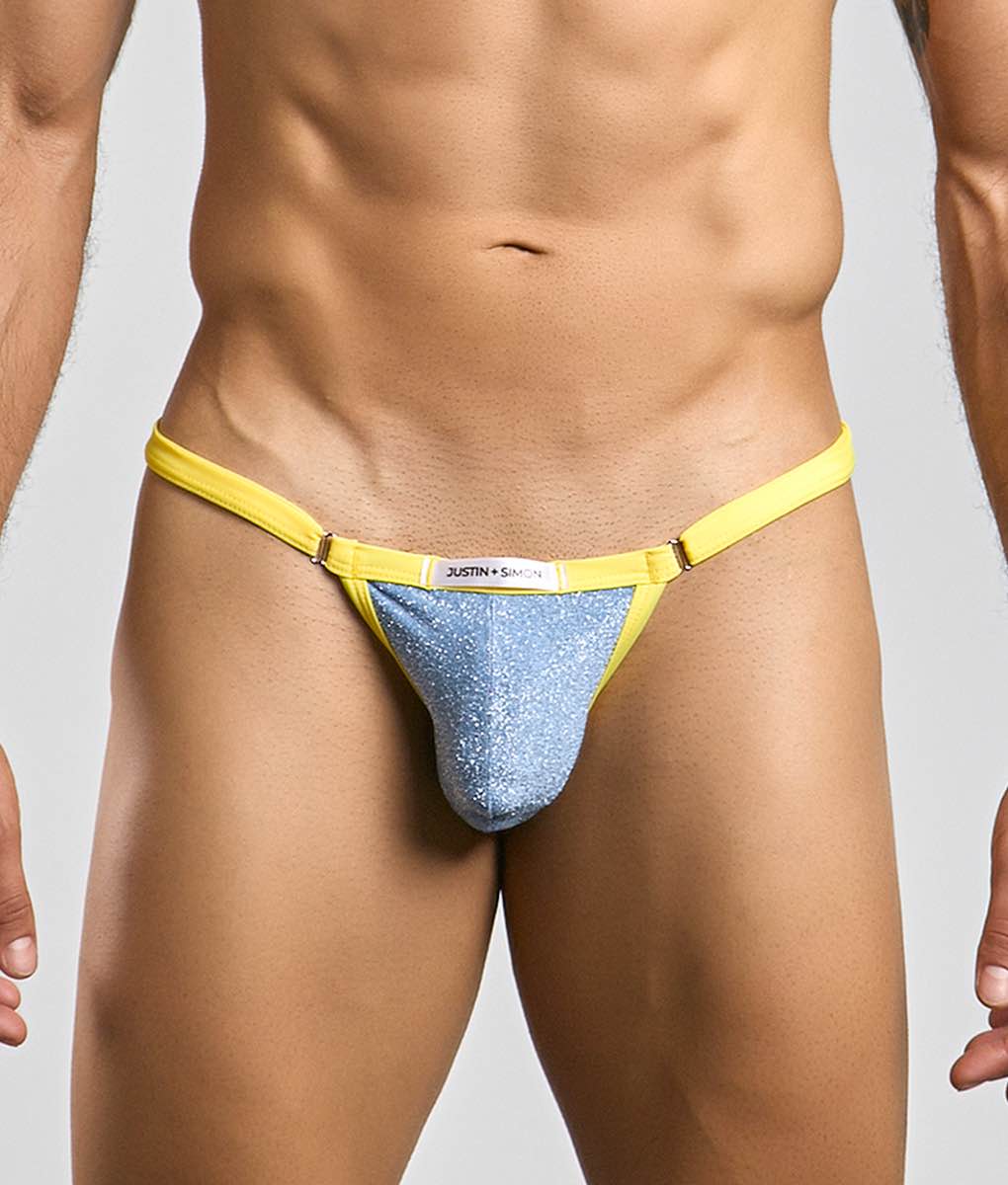 Bright yellow and shimmering blue glittery thong from justin plus simon bikini one with visible brand label