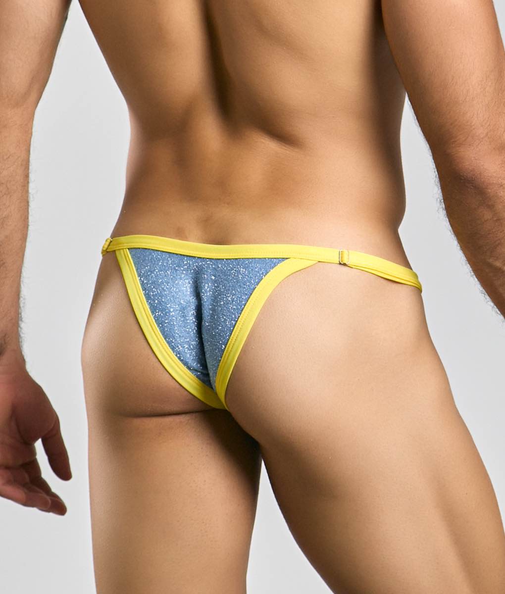 Blue glittery thong with bright yellow trim from justin plus simon bikini one collection shown from front view