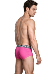Male model wearing fuchsia microfiber trunks with black waistband featuring Xtremen logo shown from back brand Xtremen