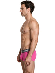 Side view of a male model wearing fuchsia microfiber trunks with a black waistband featuring Xtremen branding