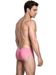 Male model wearing pink sleek microfiber briefs with a low-rise cut by Xtremen shown from the back on white background