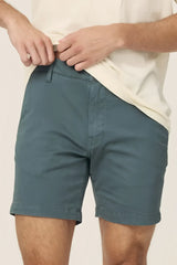 Men’s teal act chino shorts with classic fit and rolled cuffs made from lightweight breathable fabric