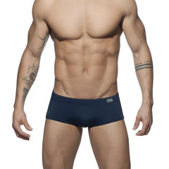 Navy blue ad basic sunga briefs with a subtle logo on the waistband designed for comfortable swimwear use
