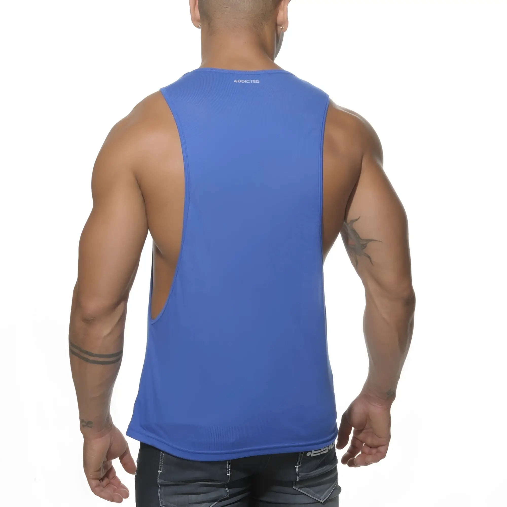 Blue sleeveless athletic tank top with back cutout and addicted branding at neckline ad logo low rider