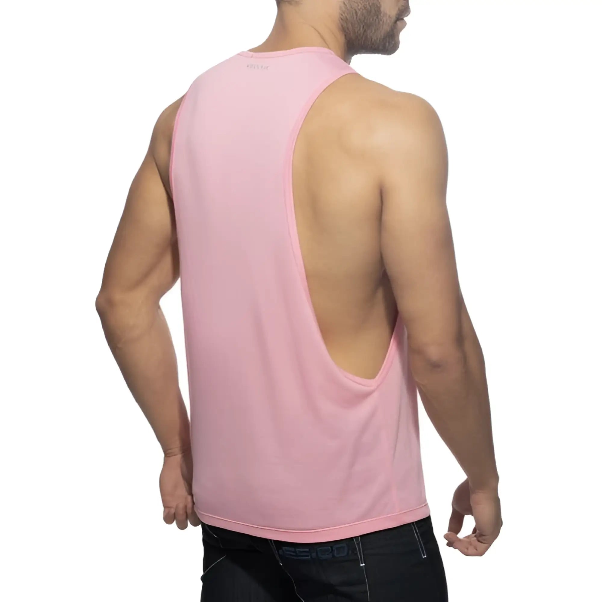 Back view of ad logo low rider pink sleeveless muscle tank top with deep back cutout for athletic wear