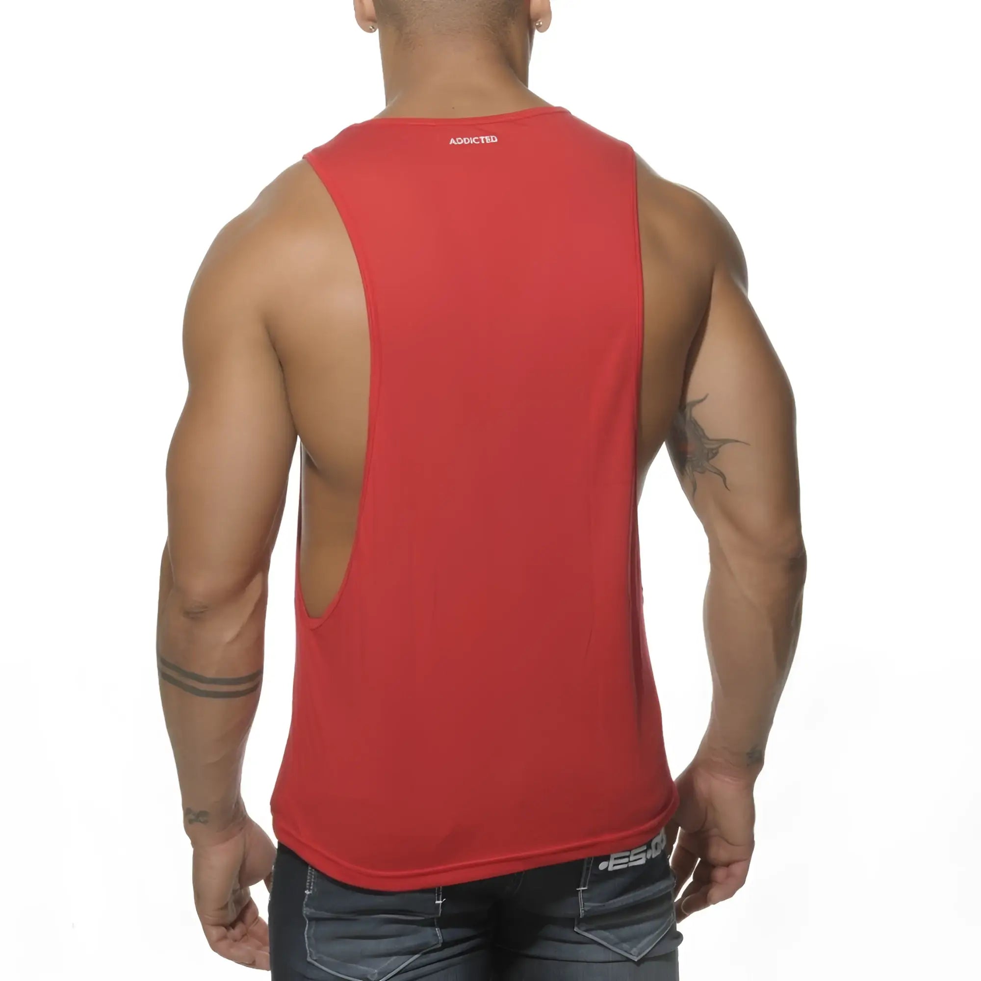 Red sleeveless athletic tank top with back cutout and addicted branding at neckline from ad logo low rider collection