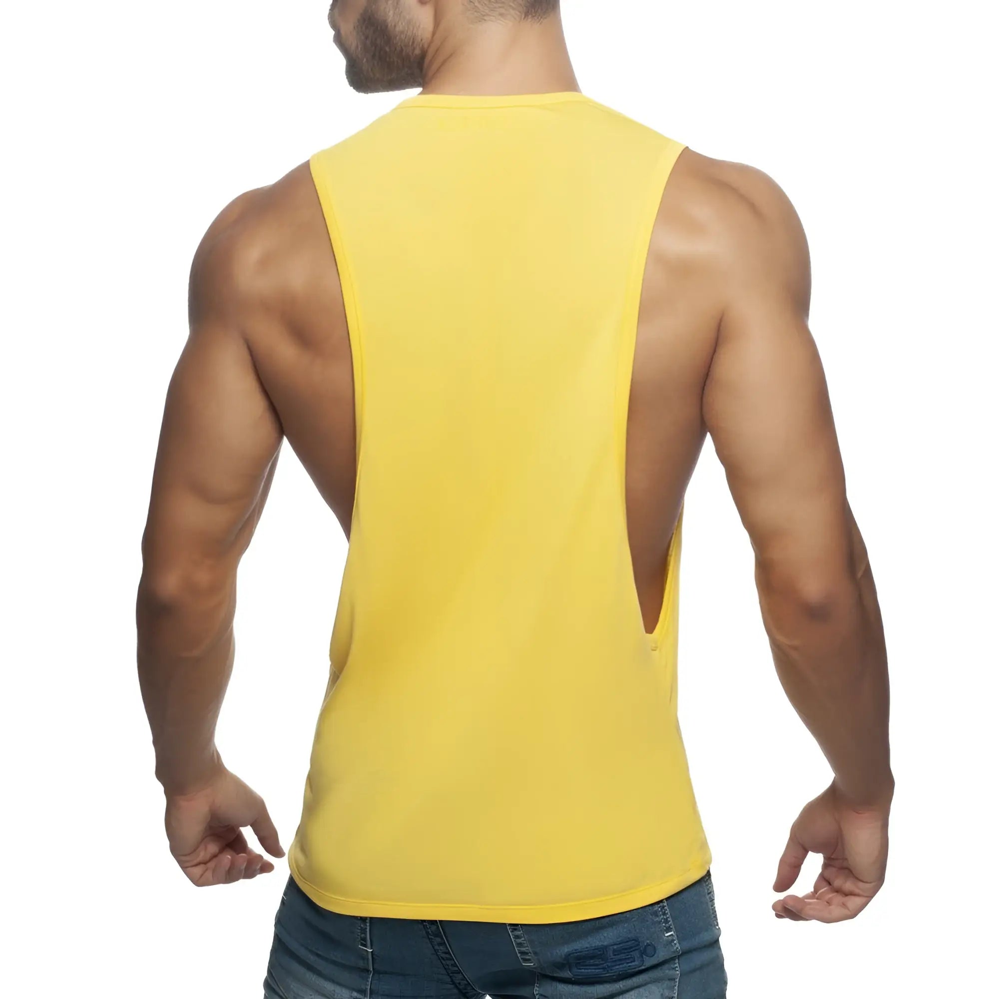 Bright yellow sleeveless muscle tank top with cutout back design from AD LOW RIDER for active wear