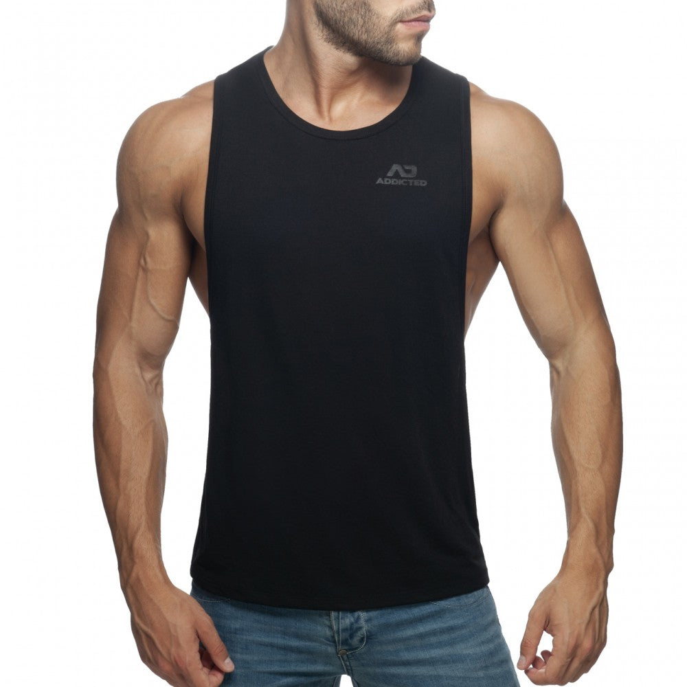 Black sleeveless tank top ad low rider with subtle gray logo on chest made from breathable fabric for casual wear