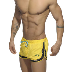 Bright yellow Addicted Rocky swim shorts with black camouflage side panels and light blue drawstring size S
