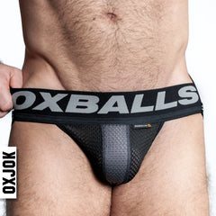 Black airmesh jockstrap briefs with a gray oxballs logo on the waistband made of breathable mesh material