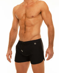 Black along slit swim short with drawstring waistband and small metallic logo on the side for swimming use